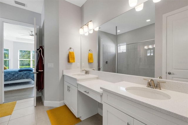 bathroom featuring a wealth of natural light, visible vents, and a sink