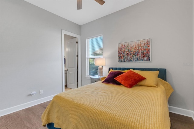 bedroom with a ceiling fan, baseboards, and wood finished floors