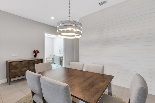 dining space featuring light tile patterned floors, baseboards, visible vents, a notable chandelier, and recessed lighting