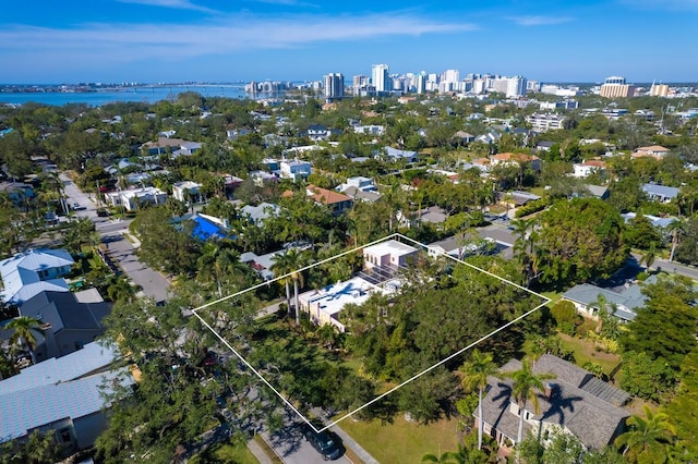 birds eye view of property featuring a water view