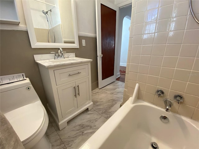 bathroom with marble finish floor, shower / bathing tub combination, vanity, and toilet