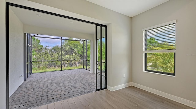 entryway with light hardwood / wood-style flooring