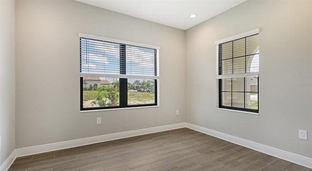 unfurnished room featuring light hardwood / wood-style floors