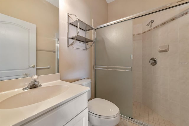 bathroom featuring vanity and an enclosed shower