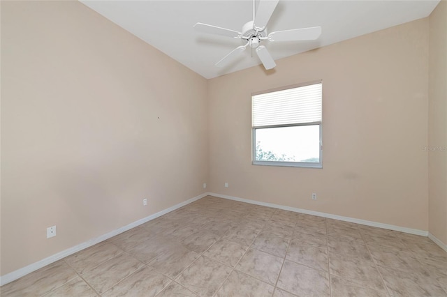 spare room with ceiling fan