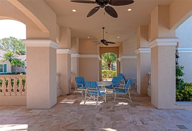 view of patio / terrace featuring ceiling fan