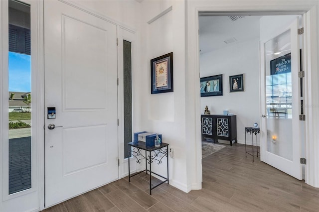 entrance foyer with light wood-type flooring