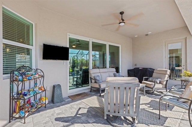 view of patio / terrace with an outdoor hangout area and ceiling fan