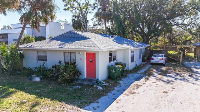 1038 25th St, Sarasota, FL 34234 - bungalow with roof with shingles and stucco siding