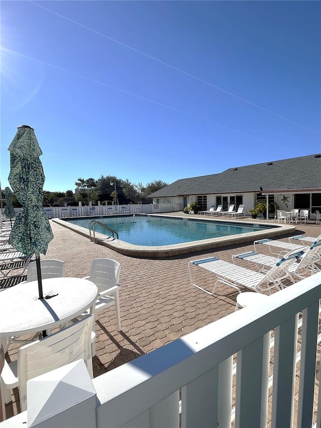 view of pool featuring a patio