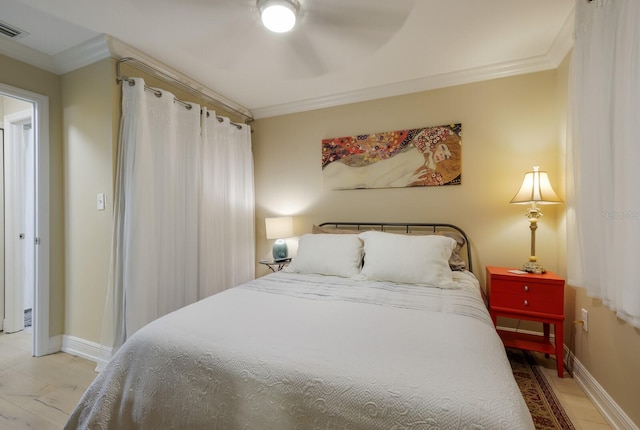 bedroom with ceiling fan and ornamental molding