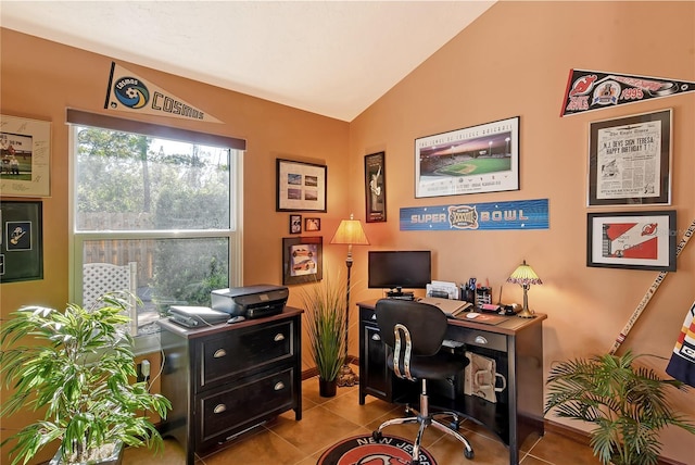 tiled office with vaulted ceiling