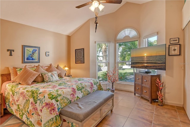 bedroom featuring high vaulted ceiling, ceiling fan, and light tile patterned flooring