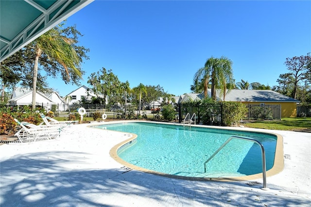 view of swimming pool featuring a patio