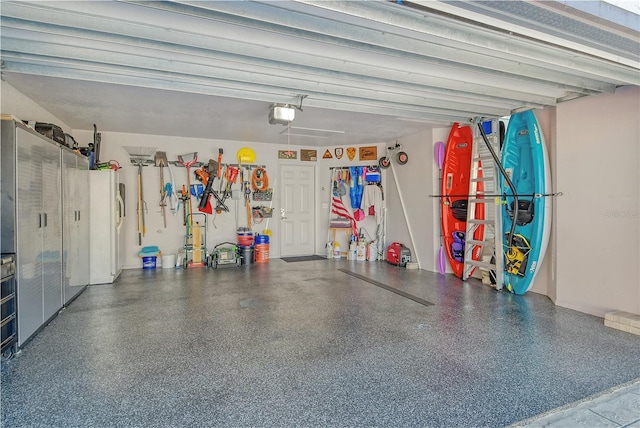 garage featuring a garage door opener