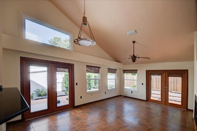 7806 Ontario Street Cir Unit 7806, Sarasota, FL 34243 - entryway with french doors, a ceiling fan, high vaulted ceiling, tile patterned floors, and baseboards
