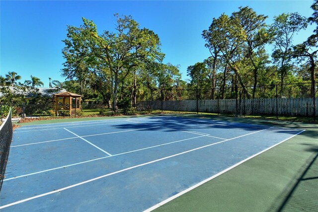 7806 Ontario Street Cir Unit 7806, Sarasota, FL 34243 - view of tennis court with a gazebo