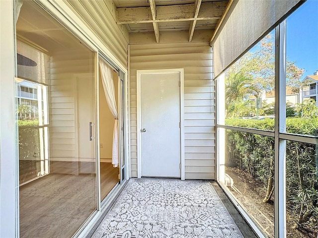 unfurnished sunroom featuring a wealth of natural light