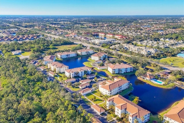 birds eye view of property featuring a water view