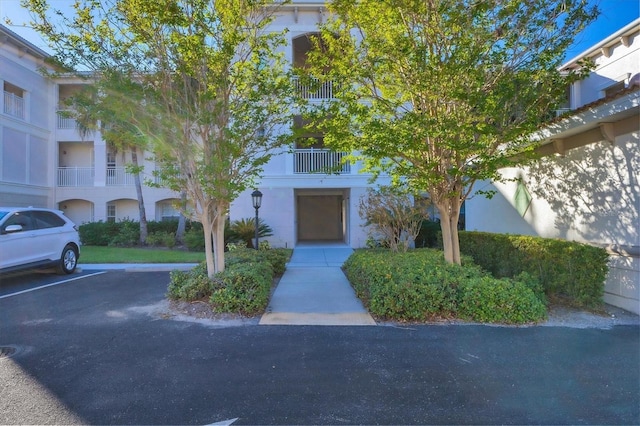 500 San Lino Cir Unit 511, Venice, FL 34292 - view of building exterior featuring uncovered parking