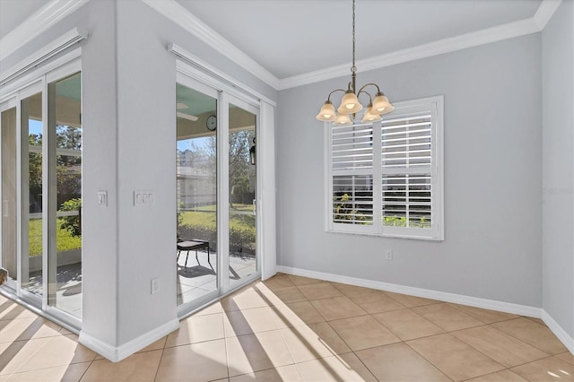 unfurnished dining area with a healthy amount of sunlight, light tile patterned flooring, and a chandelier