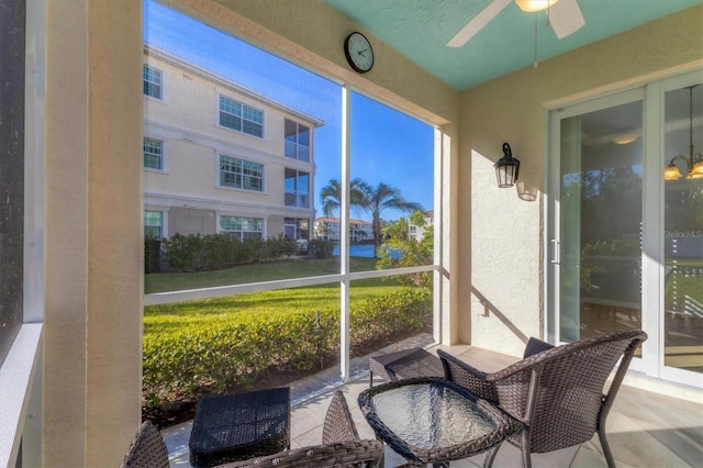 500 San Lino Cir Unit 511, Venice, FL 34292 - sunroom featuring a ceiling fan and healthy amount of natural light
