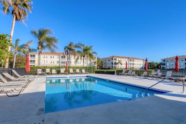 view of swimming pool featuring a patio area