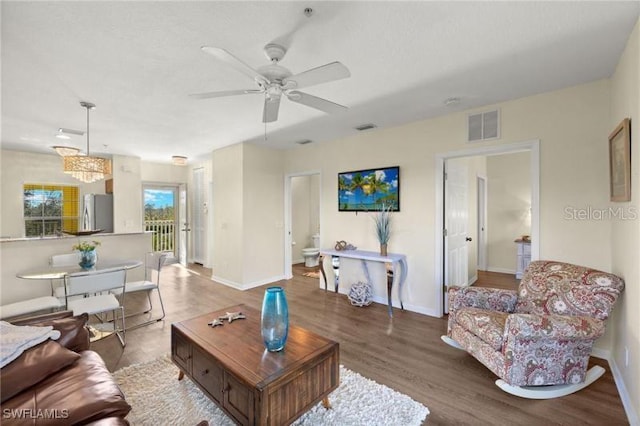 2060 Willow Hammock Cir Unit 304, Punta Gorda, FL 33983 - living area with wood finished floors and ceiling fan