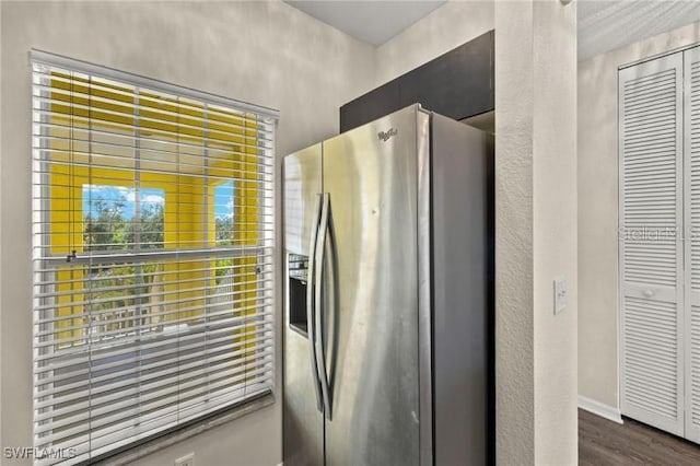 2060 Willow Hammock Cir Unit 304, Punta Gorda, FL 33983 - kitchen featuring stainless steel fridge and dark wood finished floors
