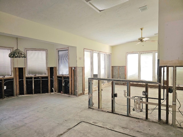 interior space featuring ceiling fan