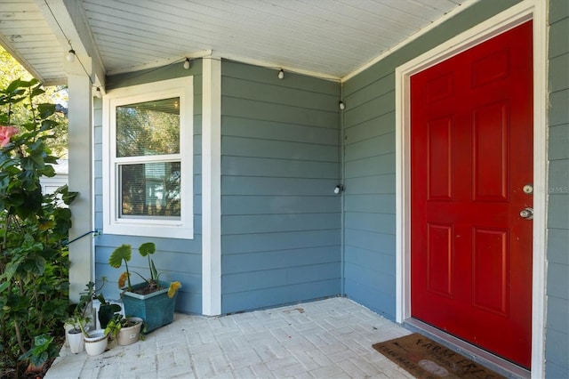 property entrance with a porch