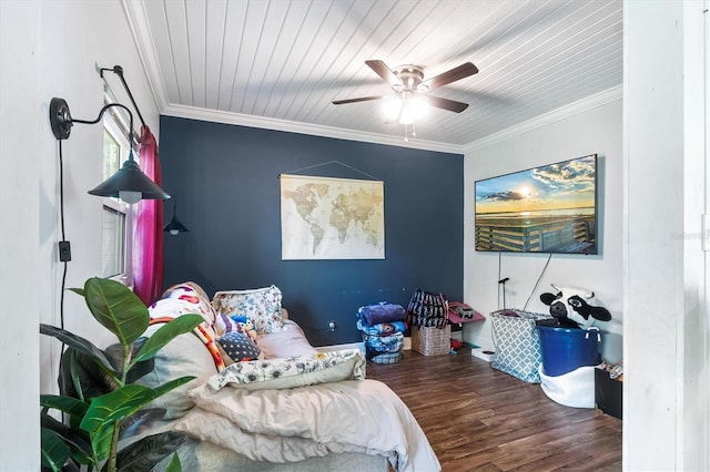 bedroom featuring dark hardwood / wood-style floors, ceiling fan, ornamental molding, and wood ceiling