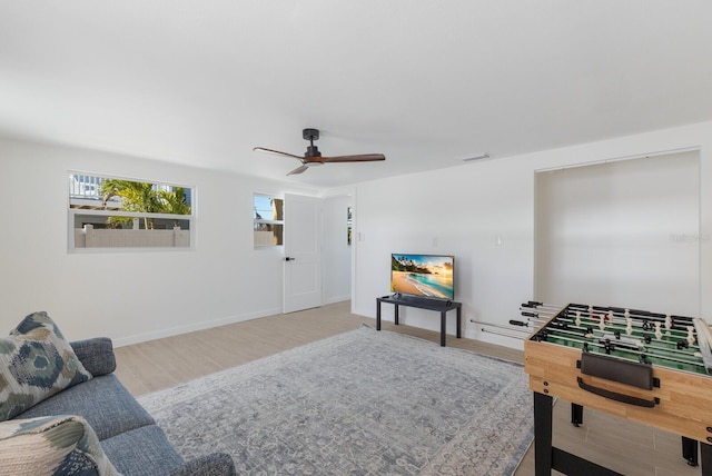 game room featuring ceiling fan and hardwood / wood-style floors