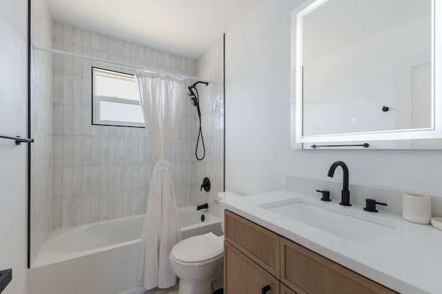 full bathroom with shower / bath combination with curtain, toilet, and vanity