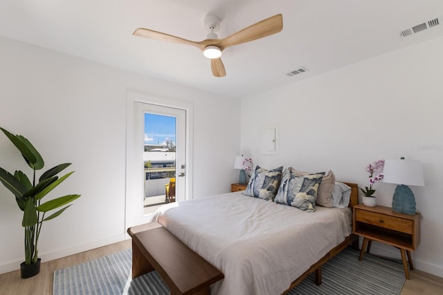 bedroom featuring ceiling fan and light hardwood / wood-style flooring