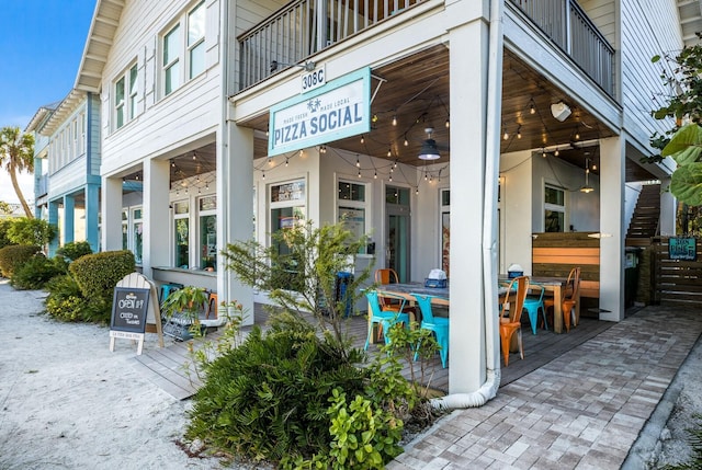 view of exterior entry with an outdoor bar