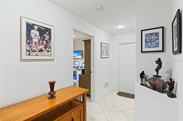 interior space featuring light tile patterned flooring