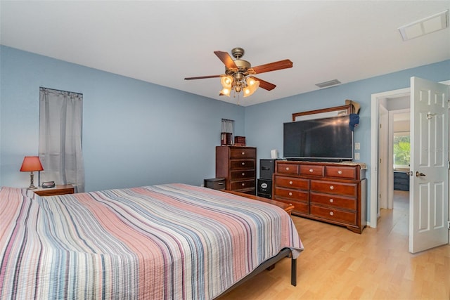 bedroom with ceiling fan and light hardwood / wood-style flooring