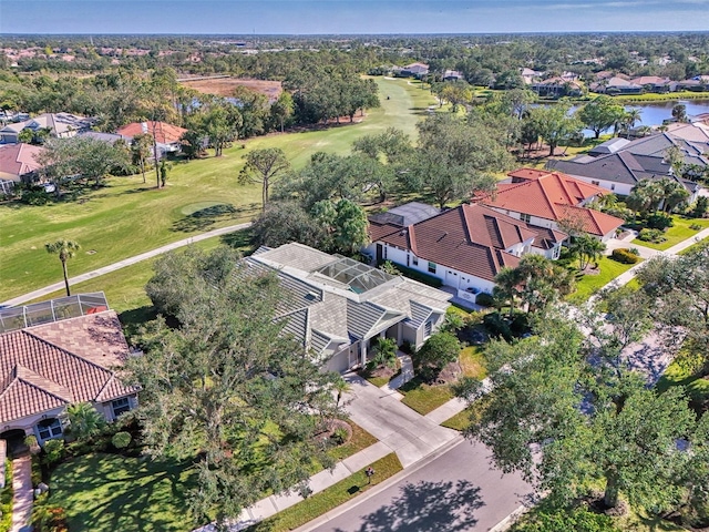 bird's eye view featuring a water view and a residential view