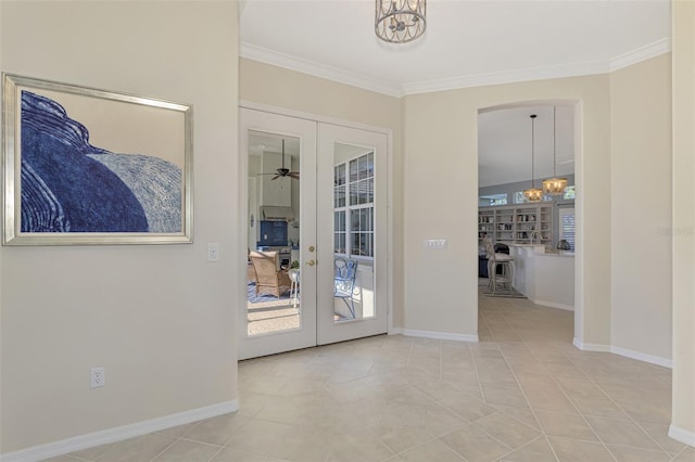 doorway featuring french doors, ceiling fan with notable chandelier, light tile patterned floors, and ornamental molding