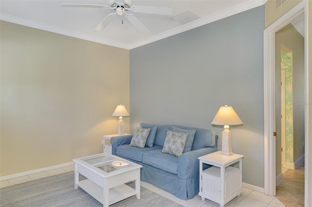 living room with ceiling fan, light tile patterned floors, and ornamental molding