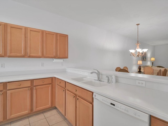 kitchen with white dishwasher, sink, a chandelier, hanging light fixtures, and light tile patterned flooring