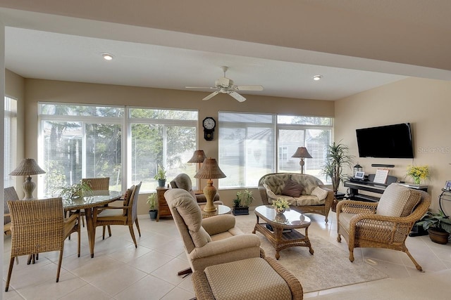 sunroom with ceiling fan