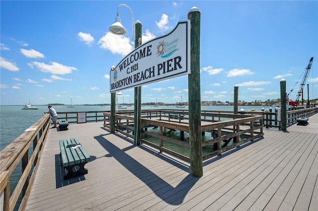 dock area with a water view