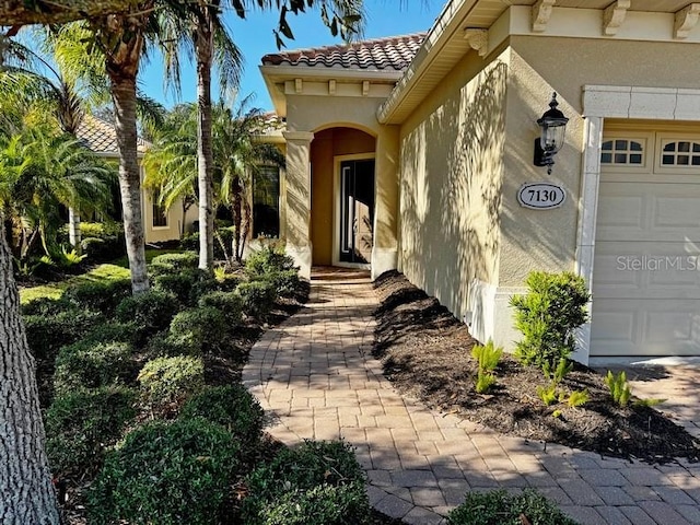 property entrance featuring a garage