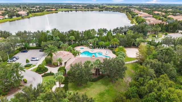 drone / aerial view with a water view