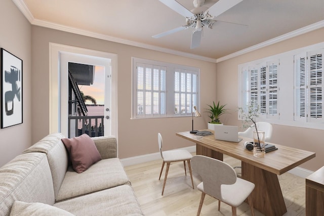 office featuring a ceiling fan, light wood-style flooring, ornamental molding, and baseboards