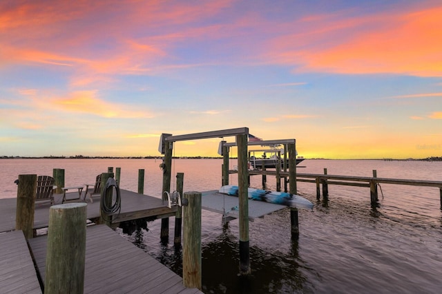 dock area with a water view