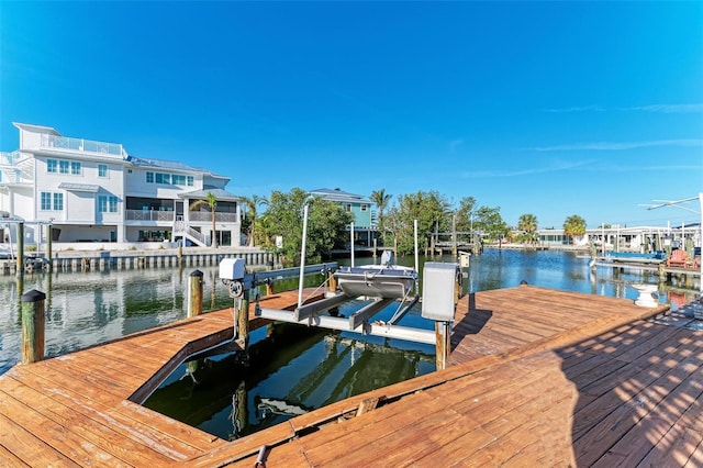 dock area with a water view