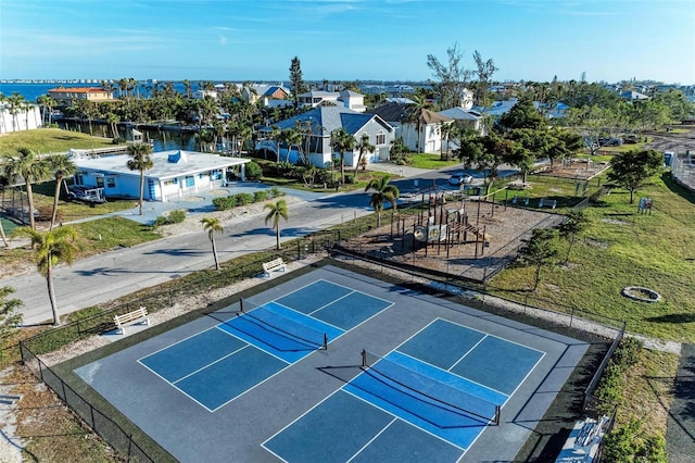 bird's eye view with a water view